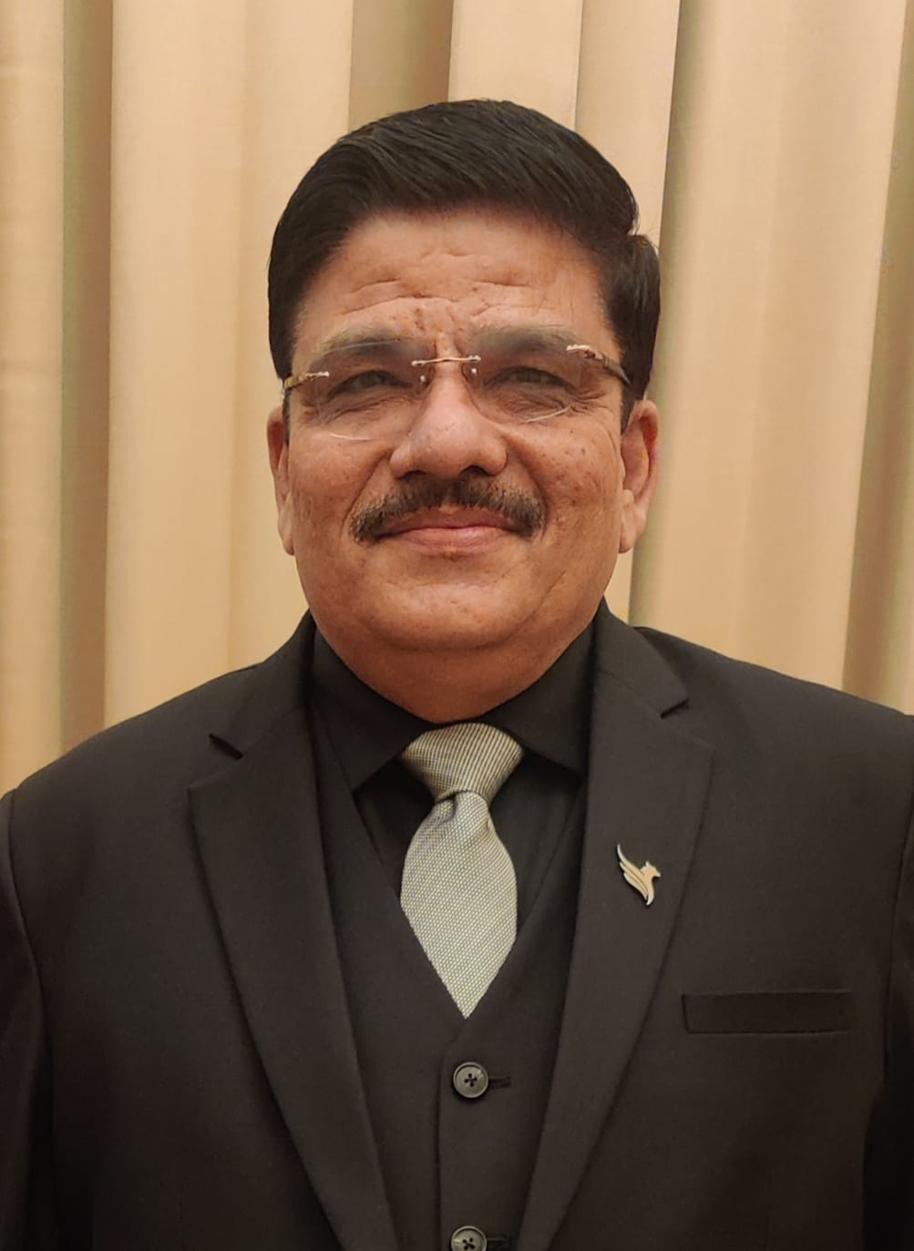 Dr. NKS