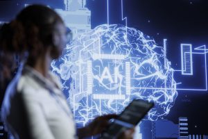 Students using laptops to learn AI without coding in classroom