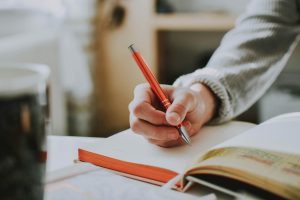 Student using memory retention hacks with flashcards