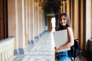 student creating a college portfolio with certificates and projects