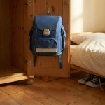 Image showing a school bag hanging on a hook and shoes placed under a bed for Class 3 preposition worksheet